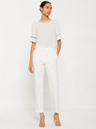 Pantalone in gabardina di cotone con decorazione in prezioso monile Fabiana Filippi
