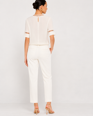 Pantalone in gabardina di cotone con decorazione in prezioso monile Fabiana Filippi