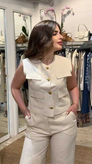 Gilet con bottoni oro Parosh